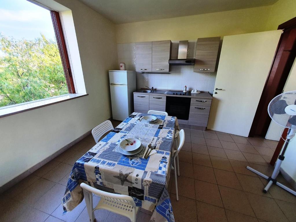 Kuchyň nebo kuchyňský kout v ubytování Via Ugento Apartments - a pochi passi dalle spiagge