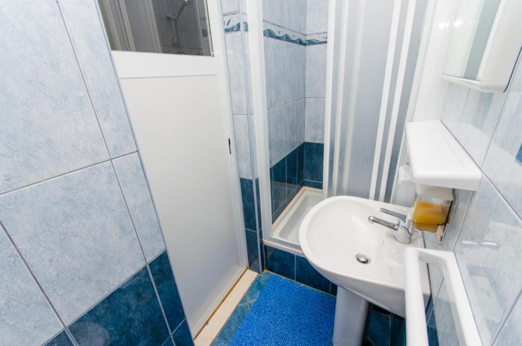 Koupelna v ubytování Apartments Ivana