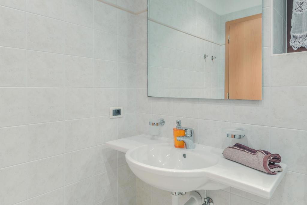 Kúpeľňa v ubytovaní Apartments Christa App B1