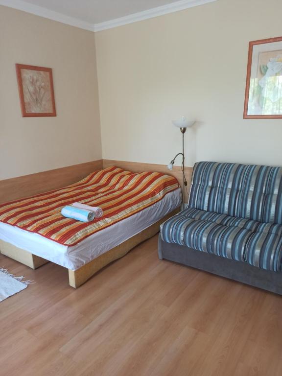 Кровать или кровати в номере Prémium Apartman