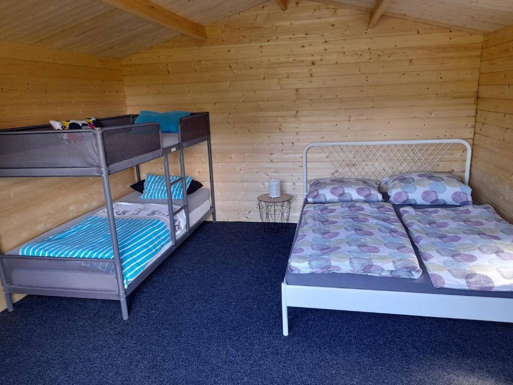 Postel nebo postele na pokoji v ubytování Camping Weides