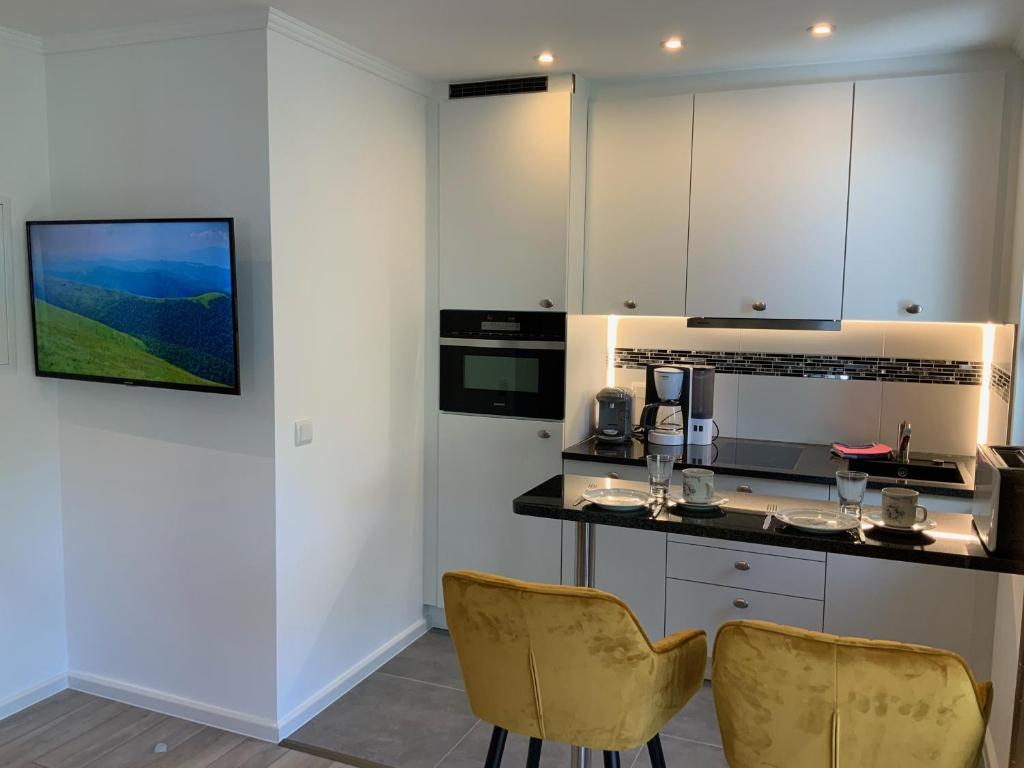 Kuchyň nebo kuchyňský kout v ubytování Hotel zum Hafen