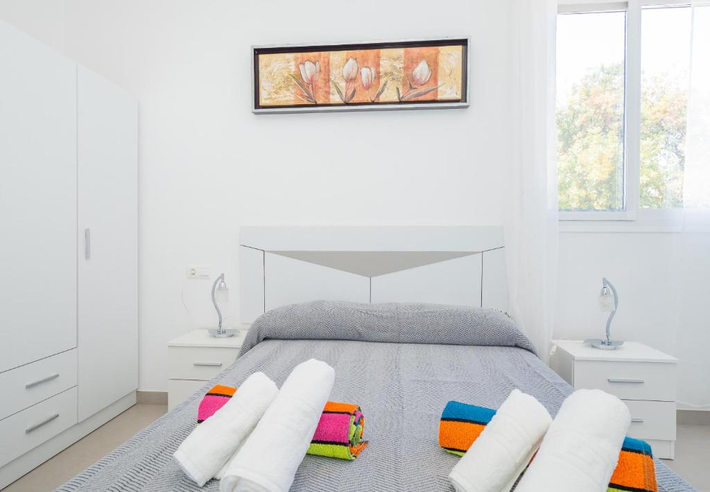 Posteľ alebo postele v izbe v ubytovaní Cubo's Villa Pilar