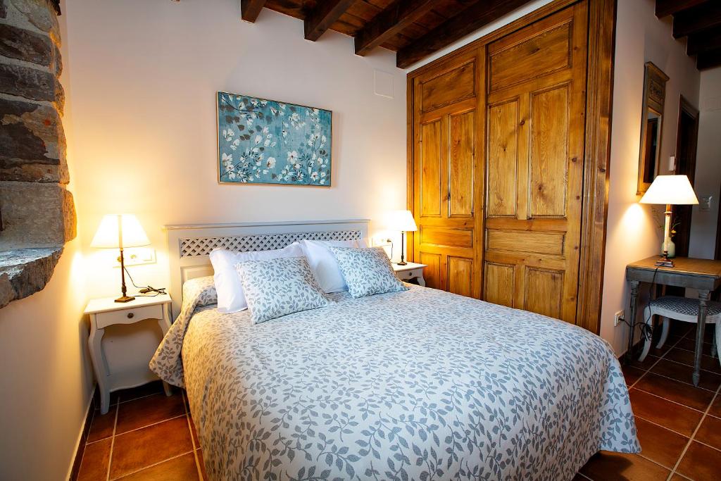 Postel nebo postele na pokoji v ubytování Casas Rurales La Cuplia