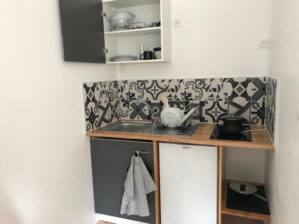 Kuchyň nebo kuchyňský kout v ubytování Appartements du Vally - Guingamp