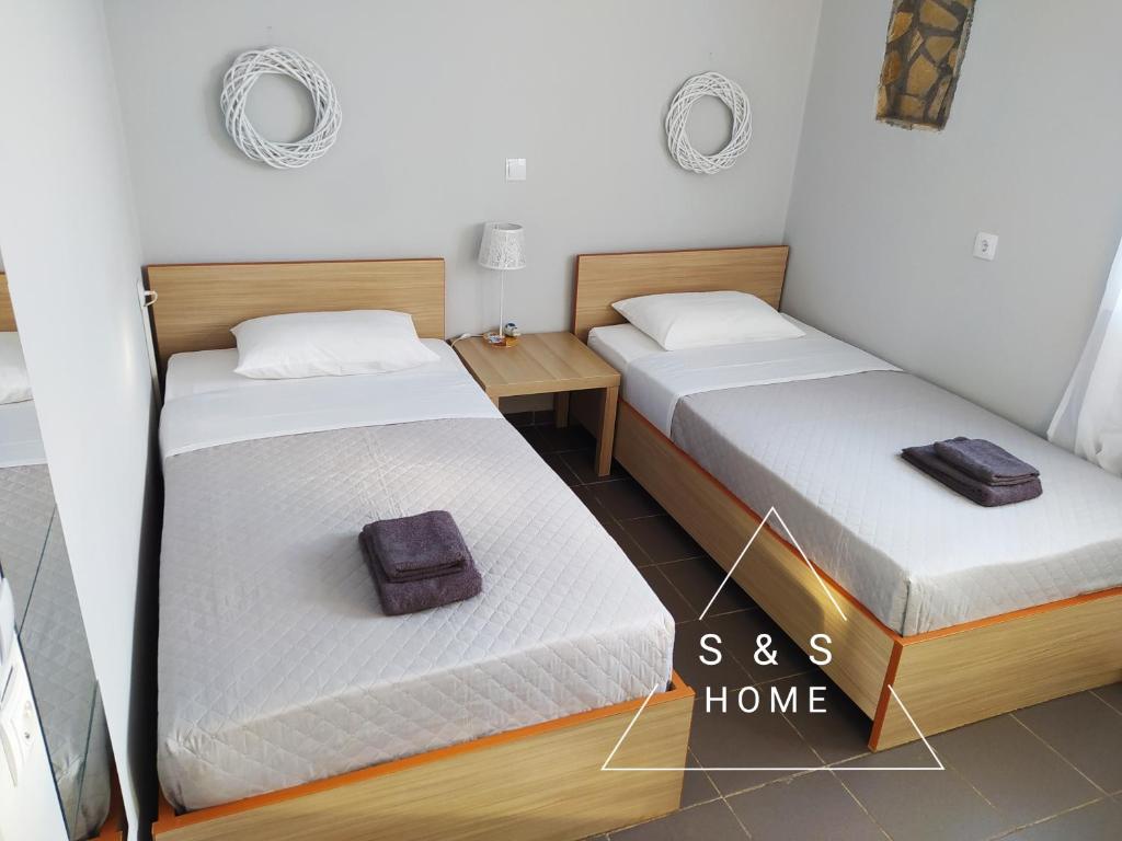 Posteľ alebo postele v izbe v ubytovaní S&S Home