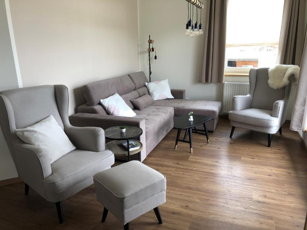 A seating area at panoramasuite Turracherhöhe