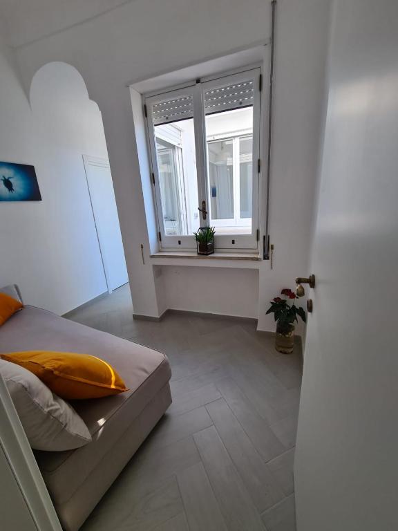 Łóżko lub łóżka w pokoju w obiekcie Casa Leucosia Suites