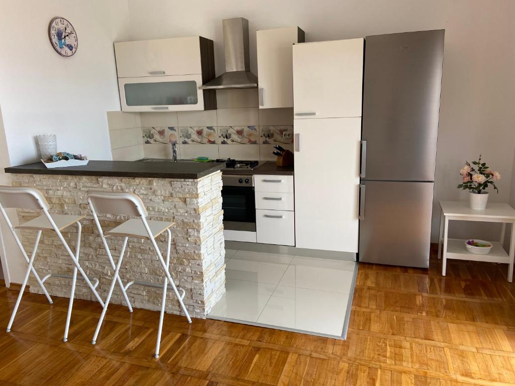 Kuchyň nebo kuchyňský kout v ubytování Apartment Iris & Elena