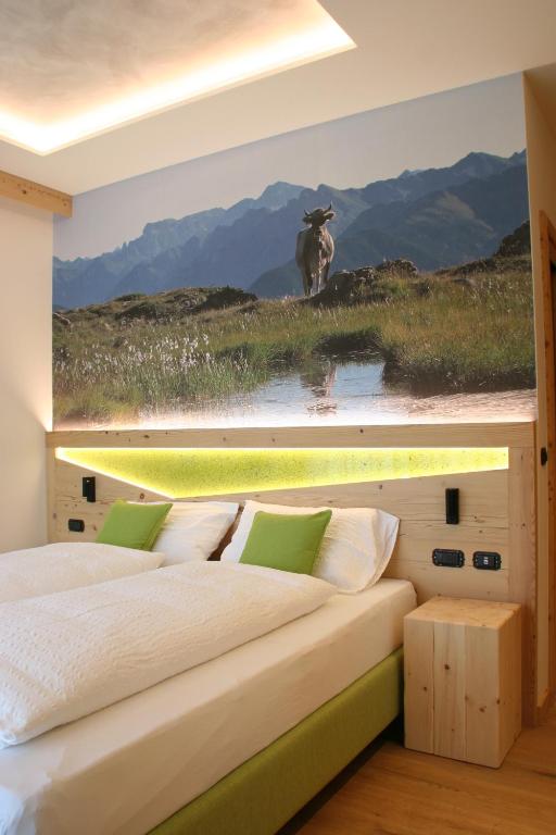 Postel nebo postele na pokoji v ubytování Agriturismo Maso Schneider