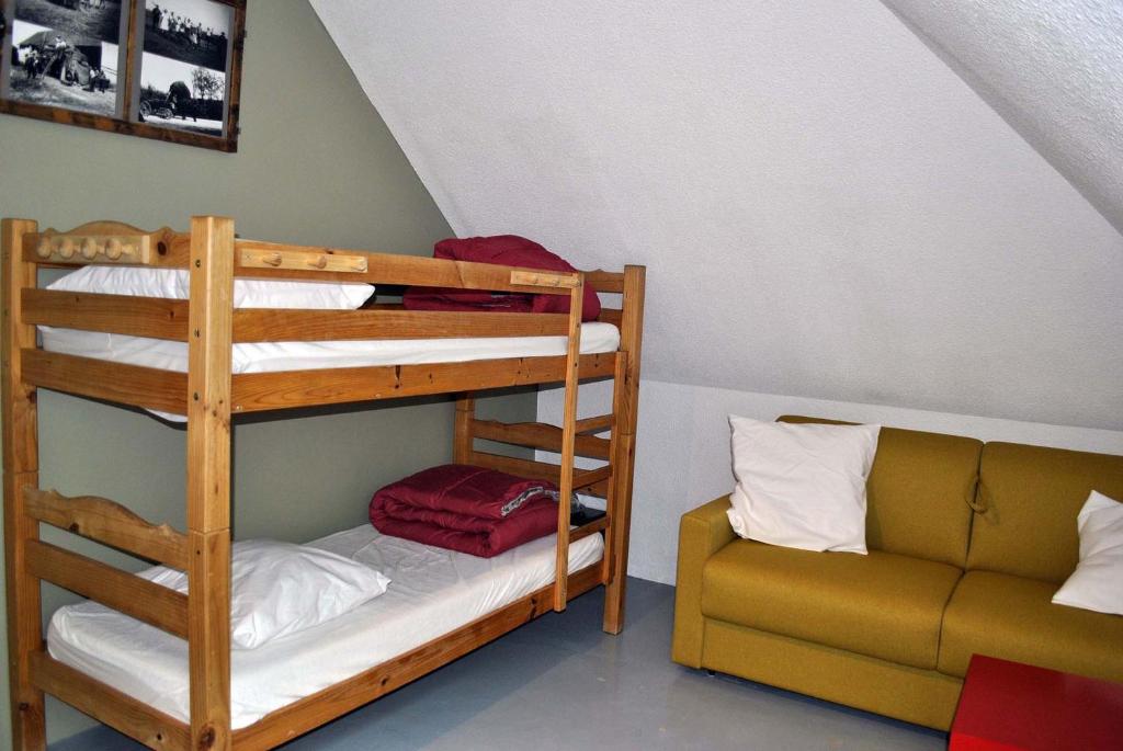 Postel nebo postele na pokoji v ubytování AUBERGE GAILLARD