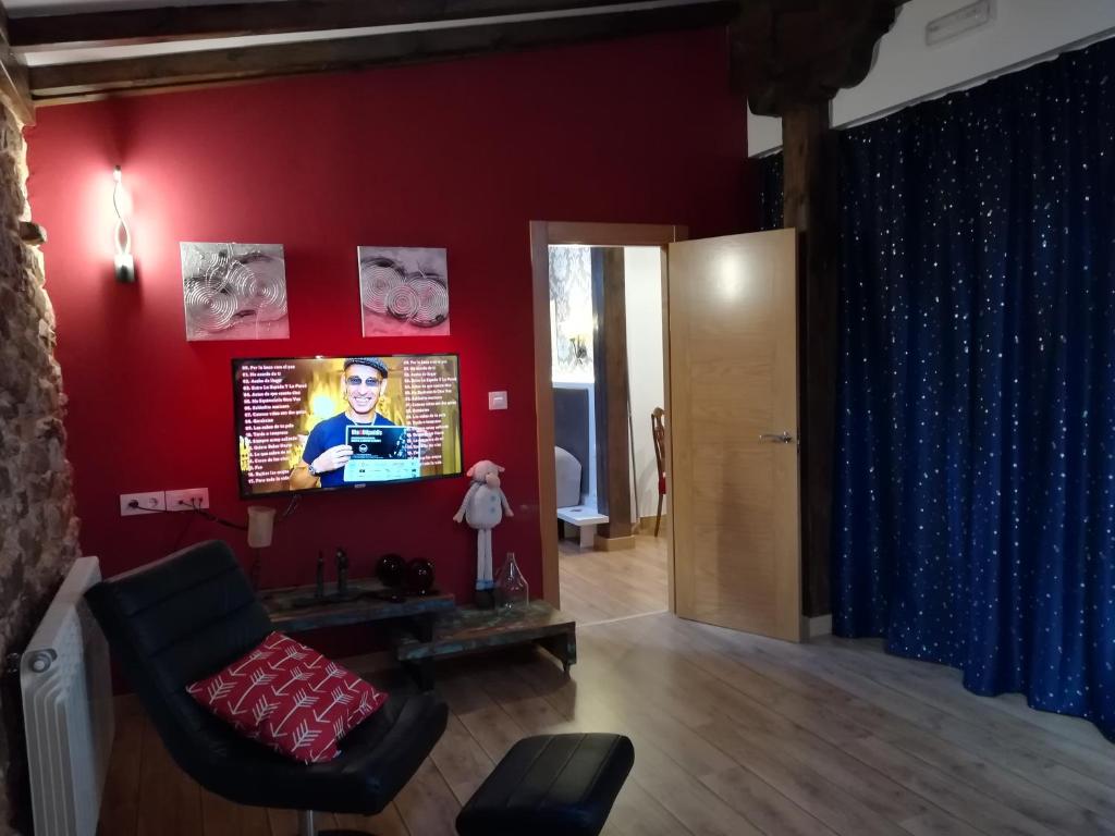 TV a/nebo společenská místnost v ubytování Posada Ormas