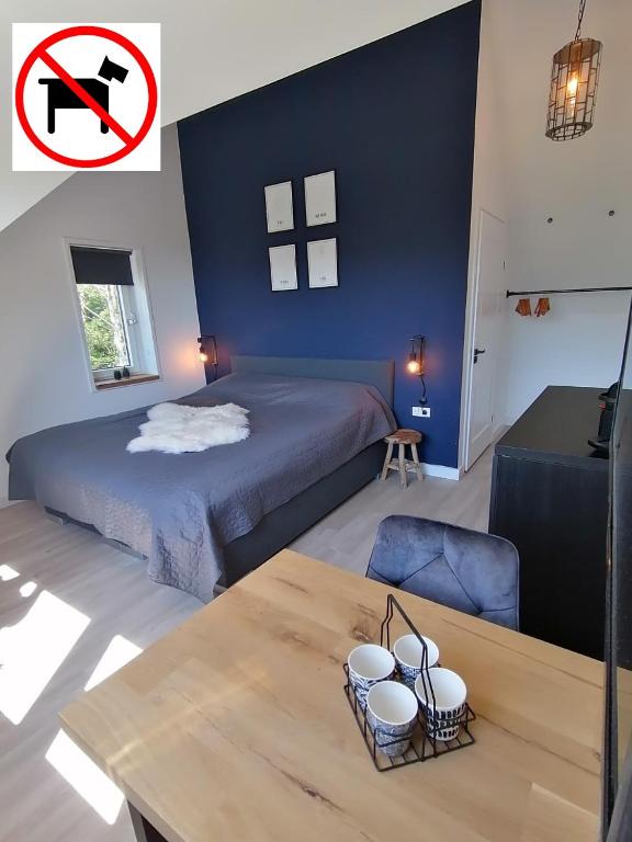 Postel nebo postele na pokoji v ubytování DOCK10TEXEL