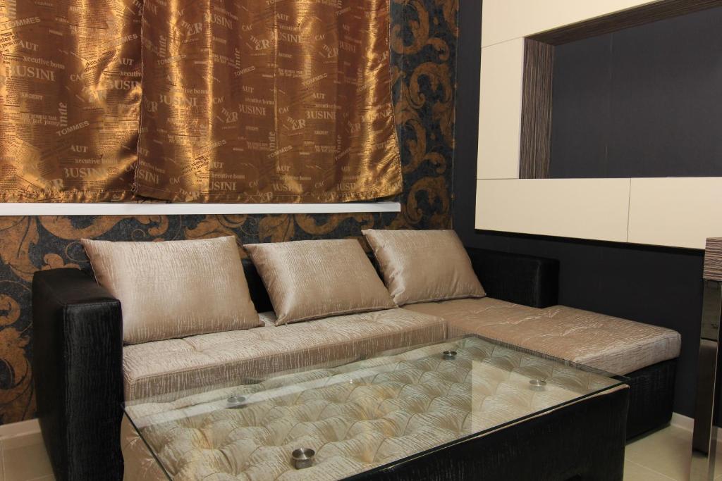 Posezení v ubytování Bedroom Place Guest Rooms