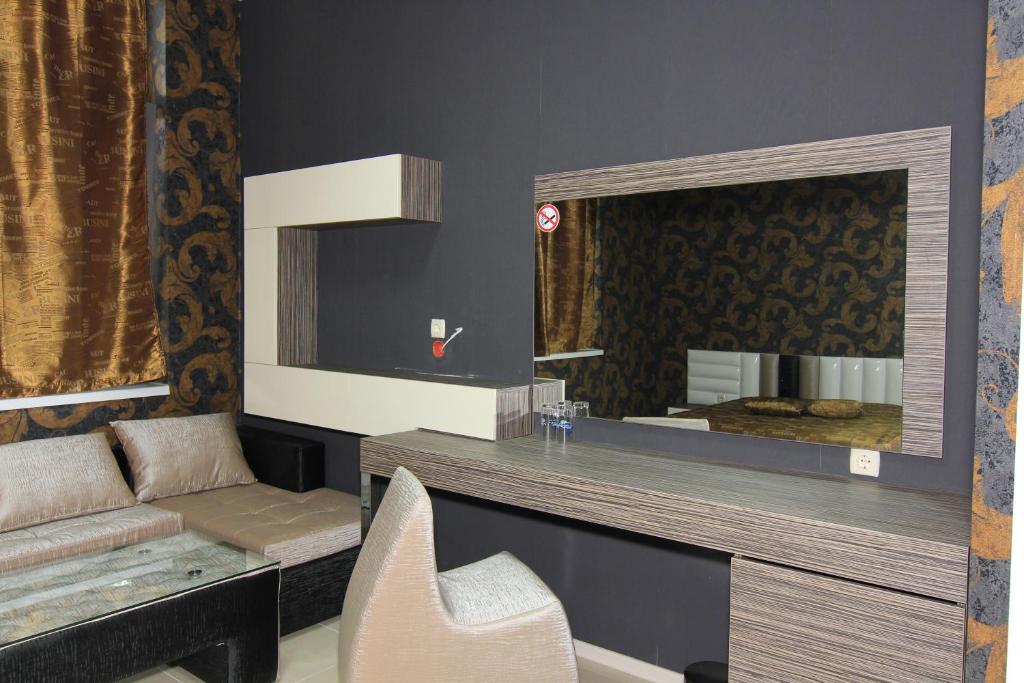 Posezení v ubytování Bedroom Place Guest Rooms