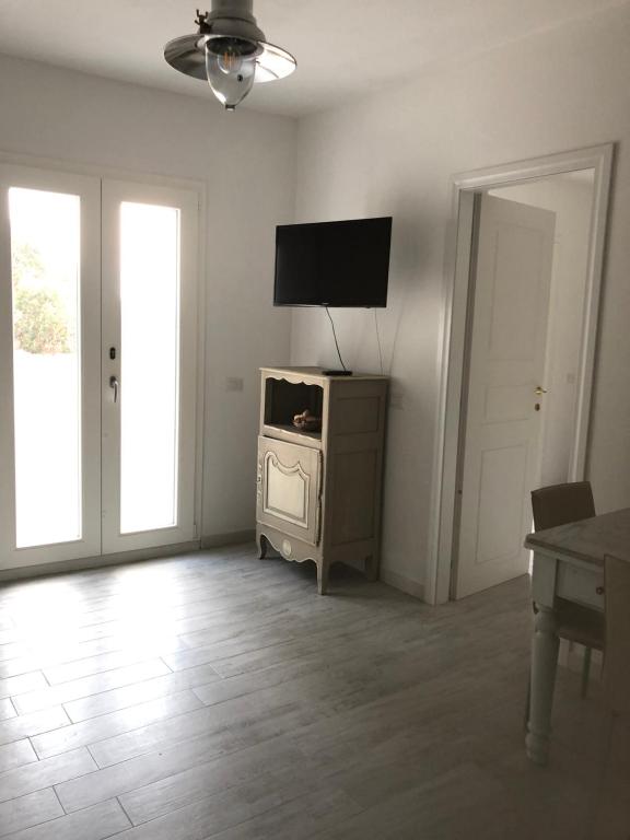 TV a/nebo společenská místnost v ubytování Luxury& Charme vista mare Sardinia House