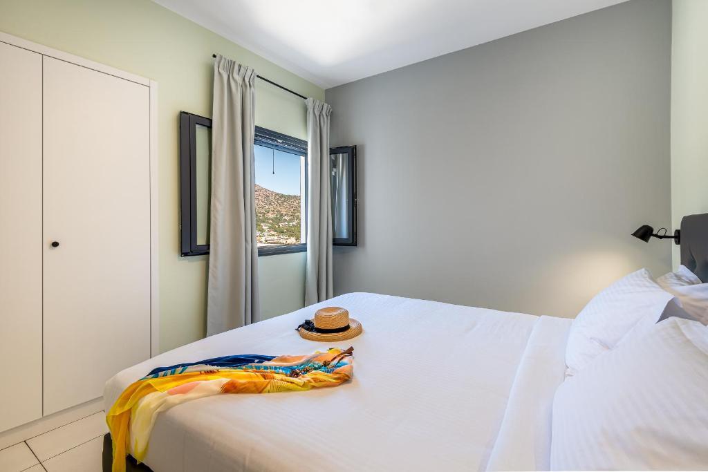 Postel nebo postele na pokoji v ubytování Minois Boutique Hotel