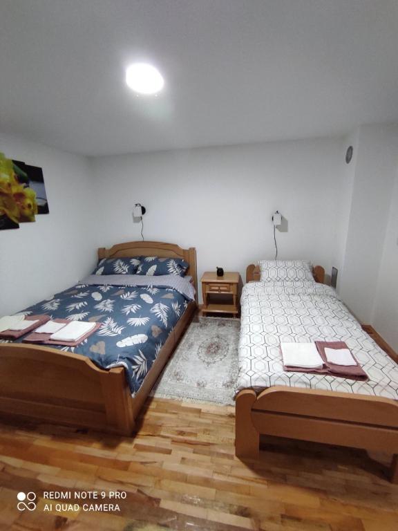 Postel nebo postele na pokoji v ubytování Vila Vera Borsko Jezero