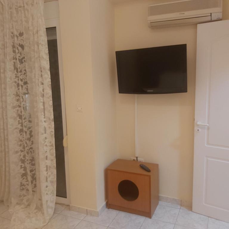 TV a/nebo společenská místnost v ubytování TSELIOS