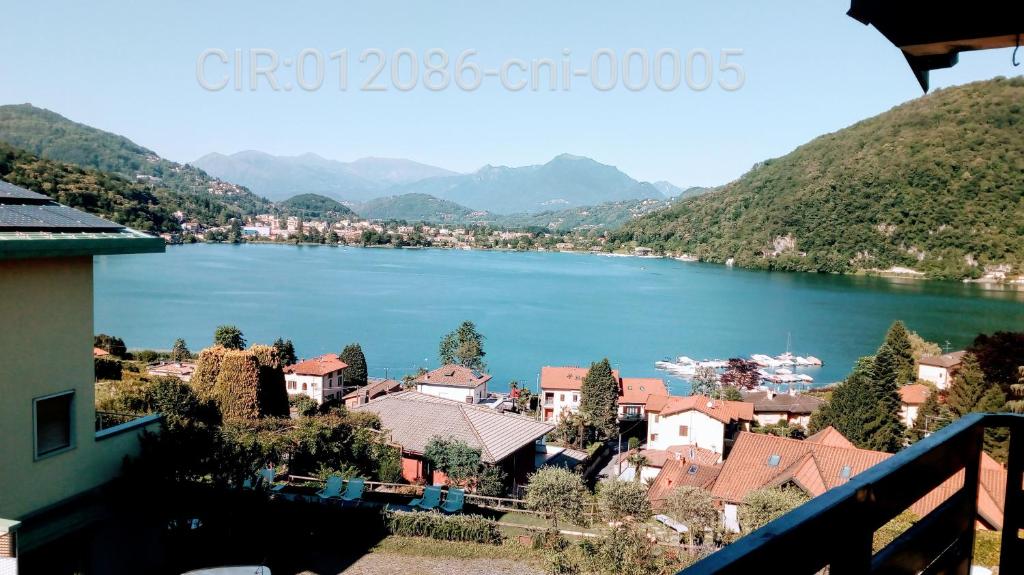 a view of a town and a lake at Villa Panoramica in Lavena Ponte Tresa