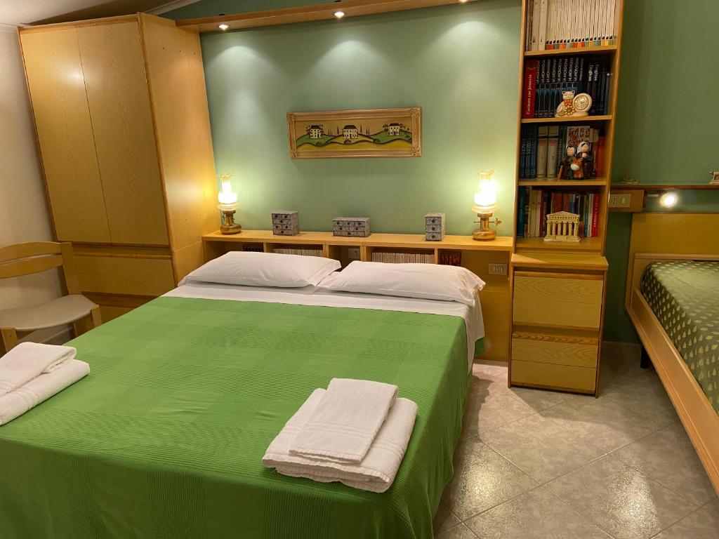 A bed or beds in a room at Residenza Antico Borgo del Pozzo