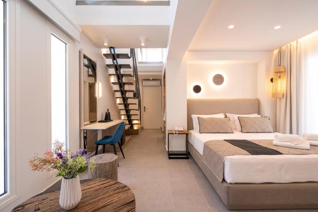 Posteľ alebo postele v izbe v ubytovaní Mirablue Luxury Residences