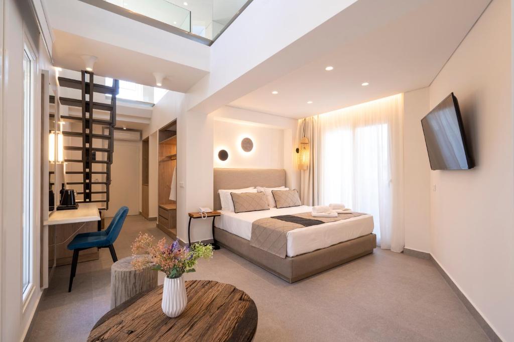 Posteľ alebo postele v izbe v ubytovaní Mirablue Luxury Residences