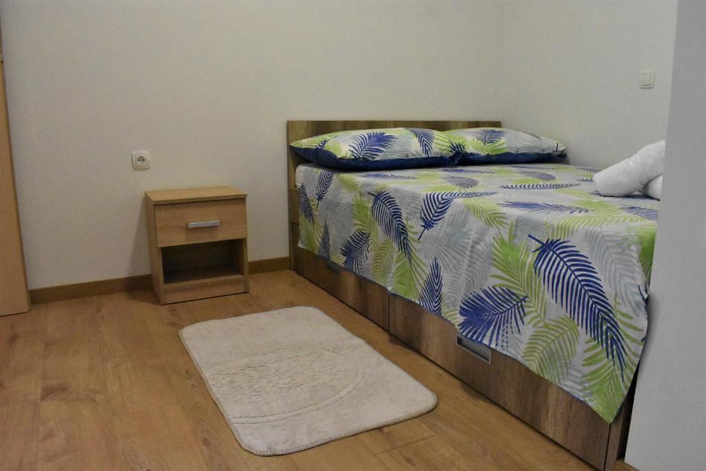 Postel nebo postele na pokoji v ubytování Apartmani Škorpion