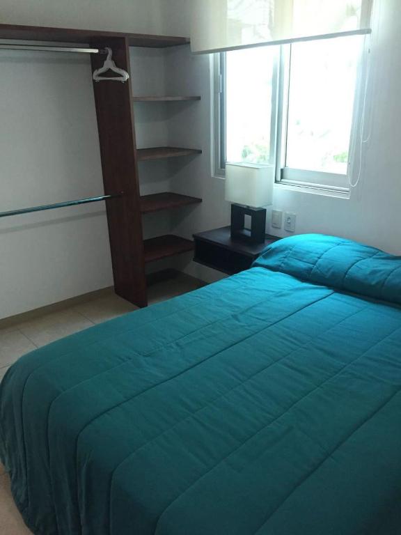 Postel nebo postele na pokoji v ubytování Zenharmony Suites