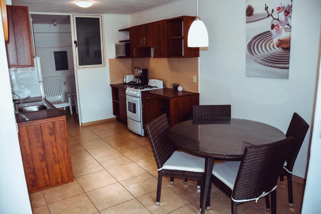 Kuchyň nebo kuchyňský kout v ubytování Zenharmony Suites