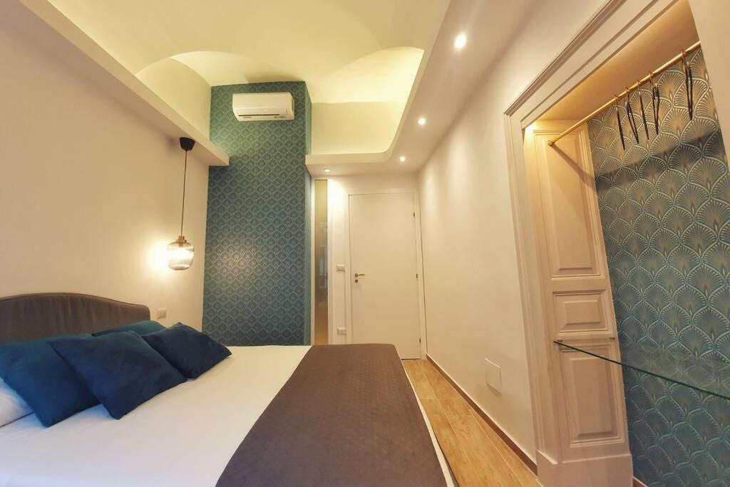 Łóżko lub łóżka w pokoju w obiekcie BluMaison - charming holiday home