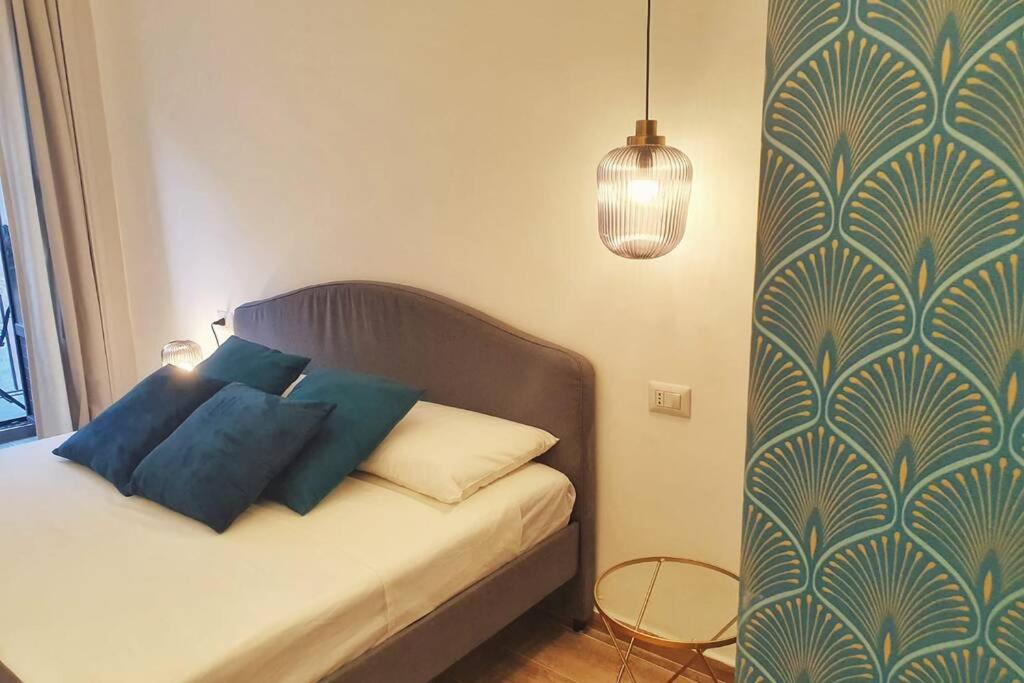 Łóżko lub łóżka w pokoju w obiekcie BluMaison - charming holiday home