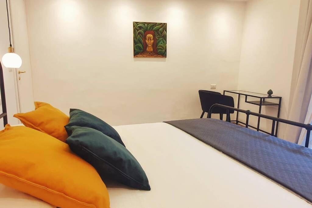 Łóżko lub łóżka w pokoju w obiekcie BluMaison - charming holiday home