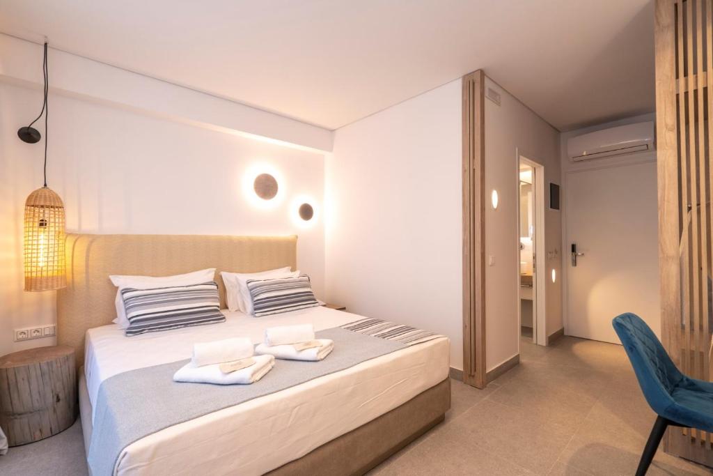Posteľ alebo postele v izbe v ubytovaní Mirablue Luxury Residences