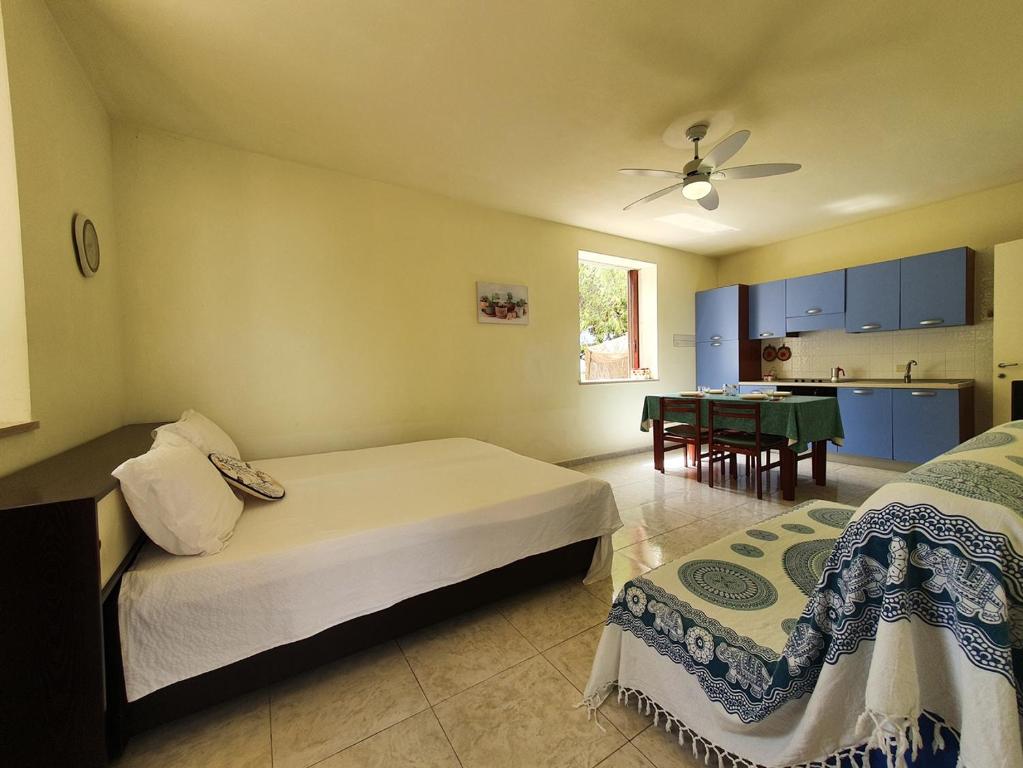 Postel nebo postele na pokoji v ubytování Via Ugento Apartments - a pochi passi dalle spiagge