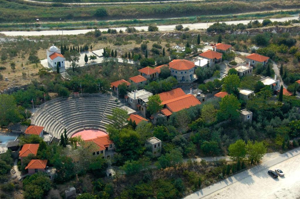 an aerial view of a small town with orange roofs at Akontisma in Néa Karváli