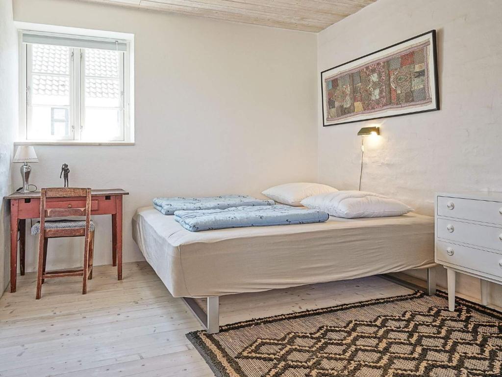 Postel nebo postele na pokoji v ubytování Panoramic Retreat in Svaneke - By Traum Ferienwohnungen