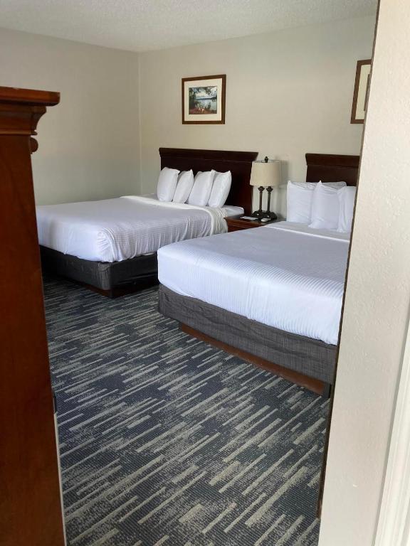 Postel nebo postele na pokoji v ubytování Park Lane Motel