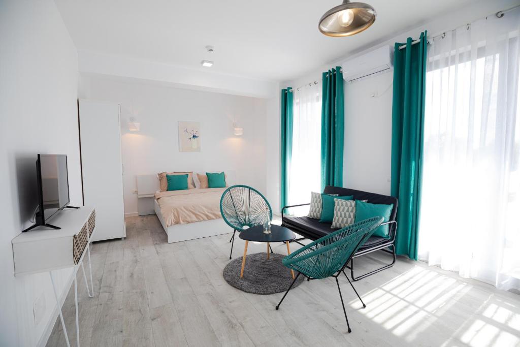 TV a/nebo společenská místnost v ubytování MIKA Studios