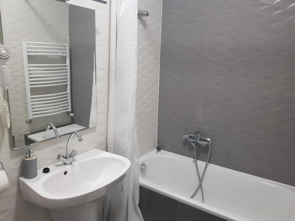 Koupelna v ubytování Zoli Apartmanok-Adri Kölcsey 32