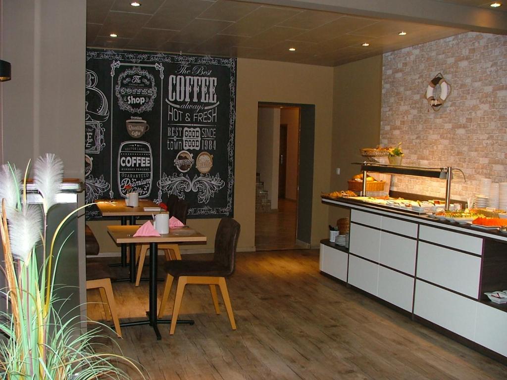 Kuchyň nebo kuchyňský kout v ubytování Hotel Thule