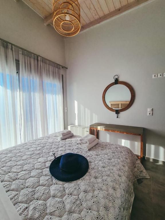 Postel nebo postele na pokoji v ubytování Owl Villas