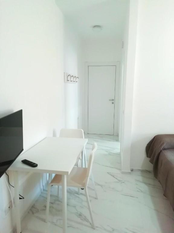 TV a/nebo společenská místnost v ubytování B&B L'Altare Bianco