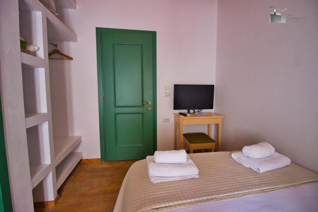 Postel nebo postele na pokoji v ubytování Argyropolis Boutique Hotel