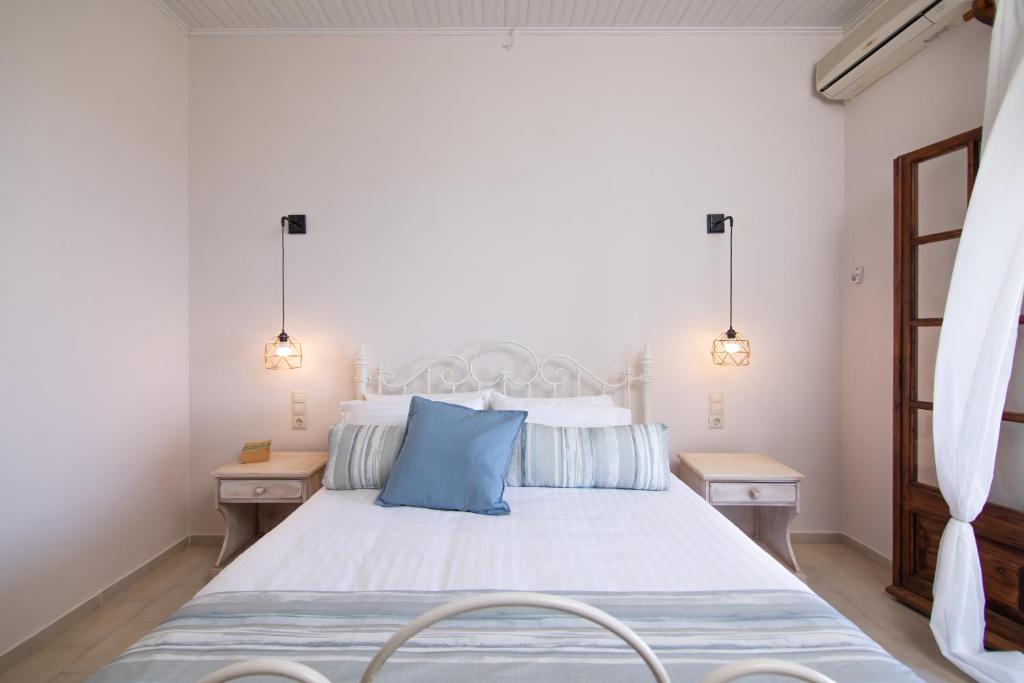 Postel nebo postele na pokoji v ubytování Giorgos apartments