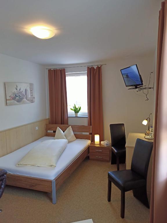 Postel nebo postele na pokoji v ubytování Hotel - Gasthof Erber
