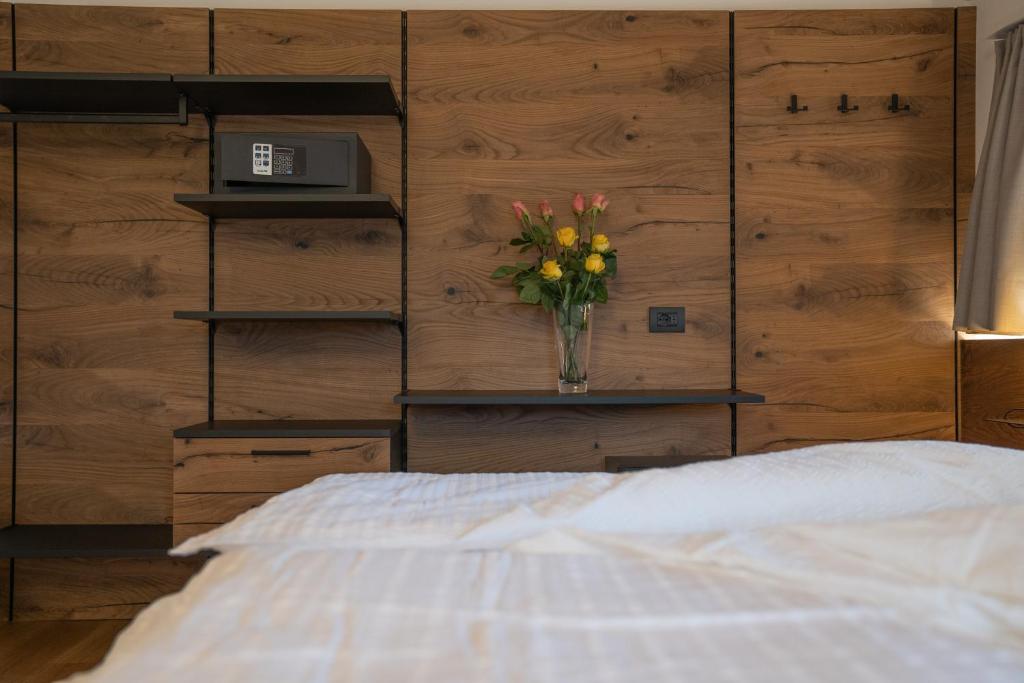 A bed or beds in a room at Agritur La Crucola