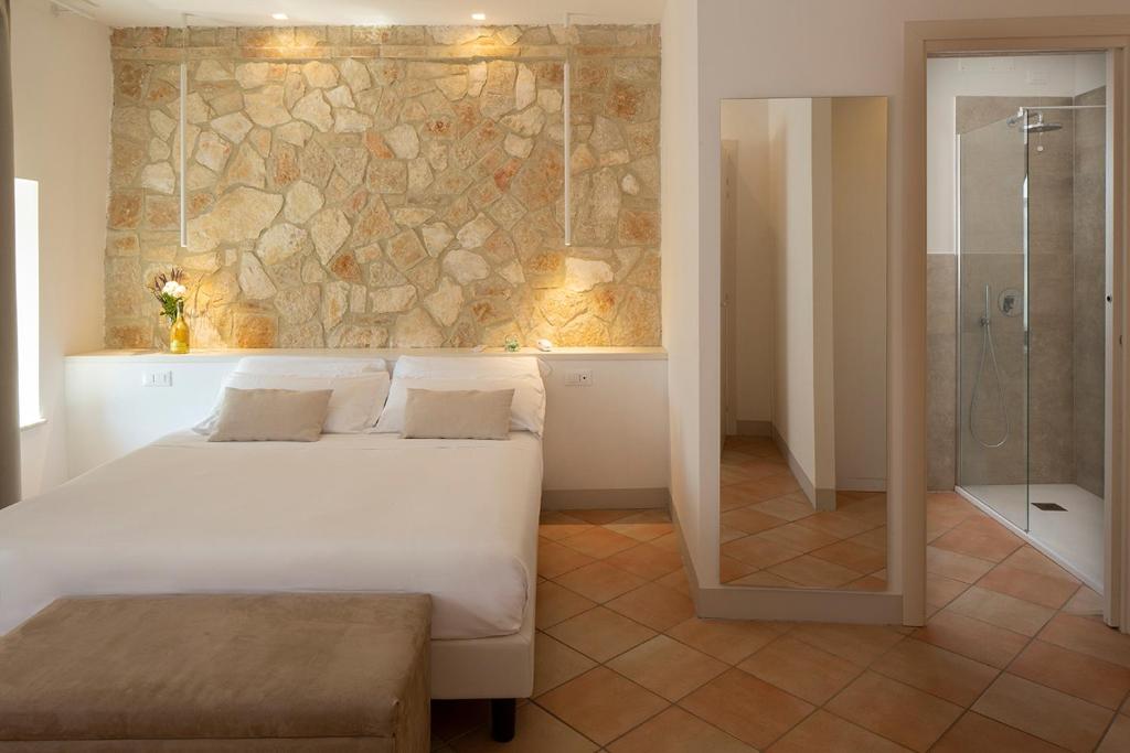 Posteľ alebo postele v izbe v ubytovaní Giotto Country House & Spa