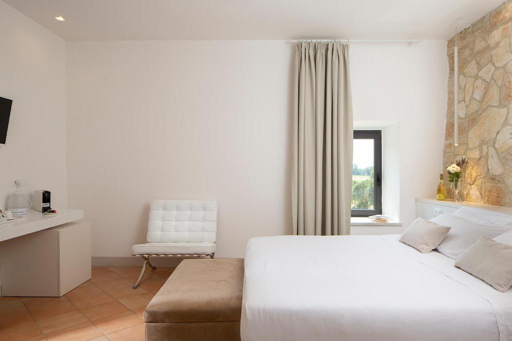 Posteľ alebo postele v izbe v ubytovaní Giotto Country House & Spa