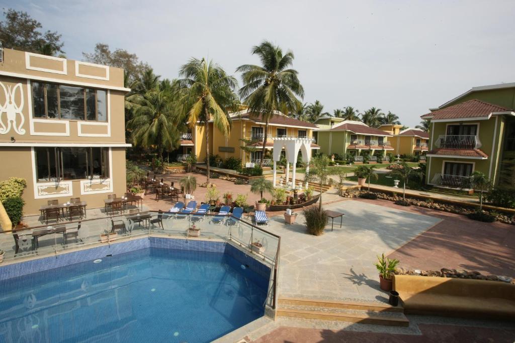 Bazén v ubytování Club Mahindra Acacia Palms nebo v jeho okolí